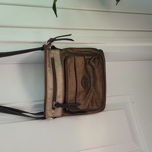 Crossbody brown and light tan color very soft in EUC.